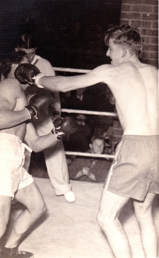 1947 Orange CYMS Jim lands a punch in boxing tournament.jpg