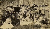 1920s Picnic Dad mid-row no hat, Jacky back row 1st man right.jpg
