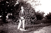 1947 Orange CYMS Jim with boxing trophy and pennant.jpg