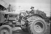 1954 Jim Farrell on Fordson tractor SN BB077.jpg
