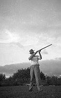 1955 Jim Farrell shotgun pose SN BB036.jpg